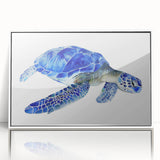 Framed wall art featuring a marine life design with a turtle, set in a sleek white frame. The vibrant colors and intricate details enhance any coastal-themed decor, perfect for ocean lovers.