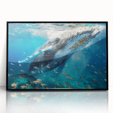 Framed wall art featuring a striking whale design, set against a black background, showcasing marine life in vibrant colors, perfect for ocean-themed decor.