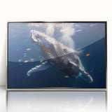 Framed wall art showcasing a stunning marine life design featuring a graceful whale, highlighted in vibrant colors and set against a silver-acrylic frame, perfect for ocean-themed decor.