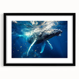 Framed wall art depicting a stylish whale design, set against a black mat, showcasing marine life in a contemporary aesthetic perfect for ocean-themed decor.