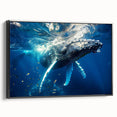 Framed canvas wall art depicting a majestic whale design, showcasing intricate marine life details in vibrant colors against a sleek black background, perfect for ocean-themed decor.