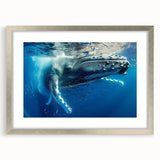Framed wall art featuring a stunning marine life design with a whale, set in a sleek silver frame, perfect for coastal-themed decor or ocean lovers.