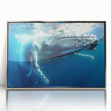 Framed wall art featuring a detailed design of a whale, showcasing marine life with silver accents, perfect for ocean-themed decor in contemporary settings.