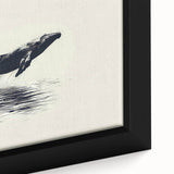 Close-up of a framed canvas wall art piece depicting a majestic blue whale swimming through vibrant ocean waves, showcasing intricate marine life details and rich colors, perfect for ocean-themed decor.