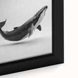 Framed canvas wall art showcasing a vibrant marine life design featuring a majestic whale in a colorful underwater scene, ideal for ocean-themed decor.