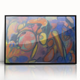 Large abstract wall art featuring mid-century modernist shapes in muted earth tones, framed in black acrylic.