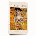 Large abstract wall art on acrylic glass, featuring muted gold and black tones in a Gustav Klimt style.