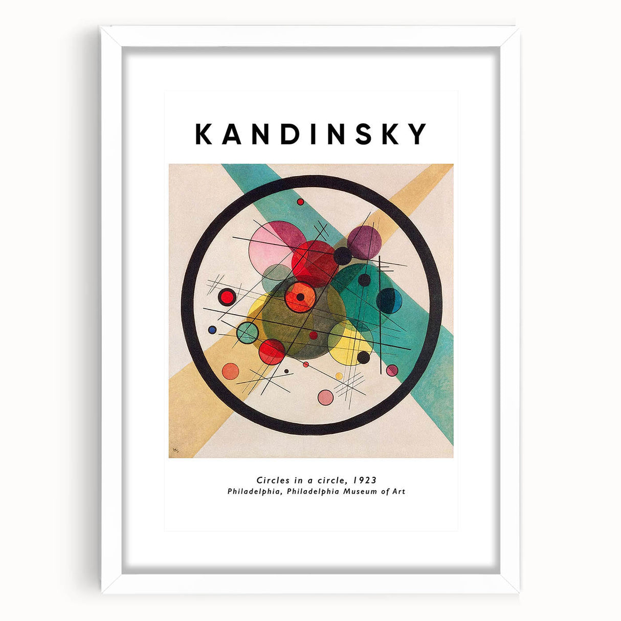 Abstract art print featuring swirling shapes in bright primary colors on a white framed canvas.