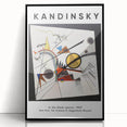 Large abstract wall art featuring swirls of vibrant colors on black acrylic, framed in black.