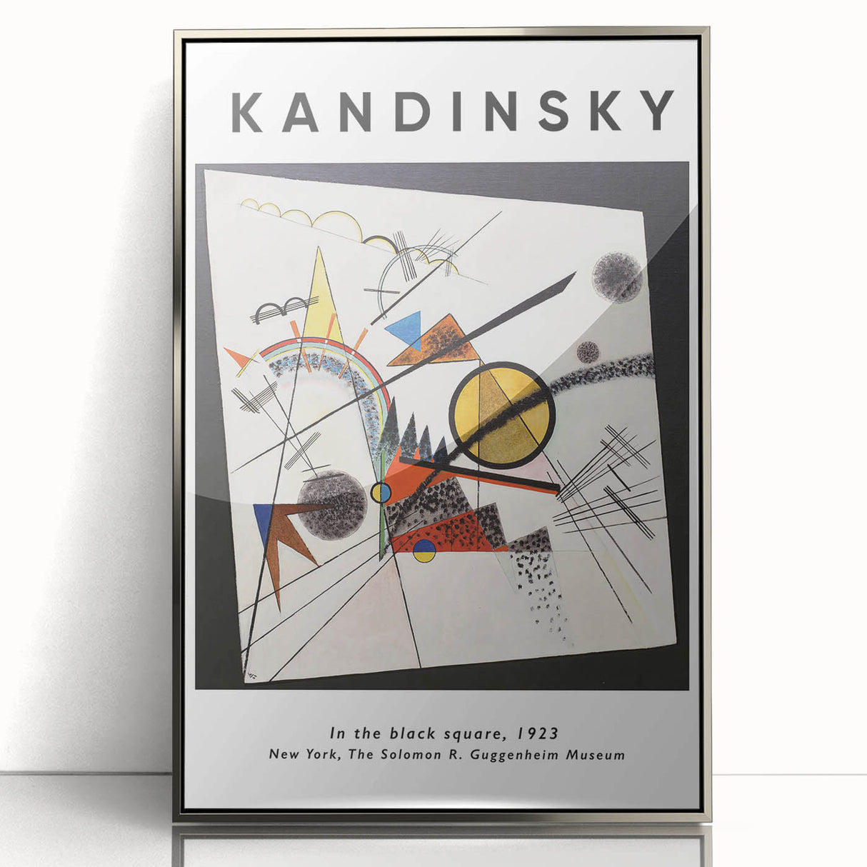 Mid-century modernist art featuring abstract geometric shapes in vibrant colors on a silver-framed acrylic print.