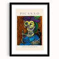 Extra large abstract art print featuring vibrant, textured colors in a black frame, ideal for living room decor.