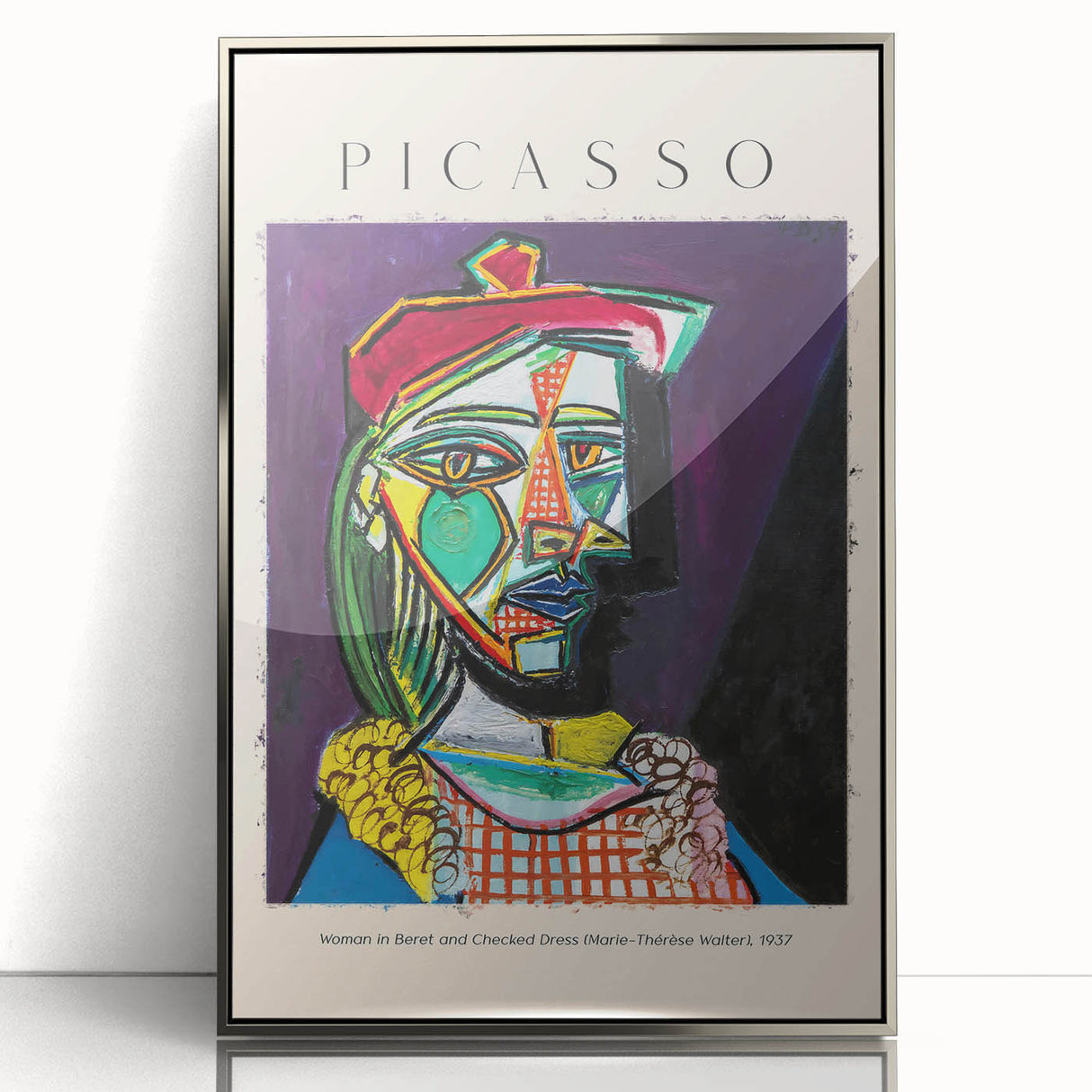 Mid-century modernist art featuring abstract shapes in vibrant colors on a silver-framed acrylic.