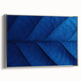 Framed canvas featuring a landscape art painting with colorful floral designs on a black background.