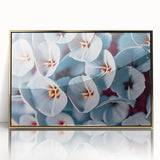 Large art print of close-up floral design in gold frame, featuring muted earth tones, ideal for nursery wall art.