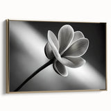 Framed canvas depicting a close-up floral design in muted gold and black tones, suitable for bedroom wall art.