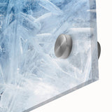 Close-up of frost design in cool blue and white tones on acrylic glass, suitable as mid-century modernist dining room art.