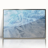 Silver-framed acrylic print of a close-up frost design in cool blue tones, suitable for modern art wall decor.