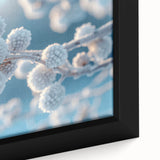 Close-up of textured black wall art depicting frost designs in vibrant colors on a framed canvas.