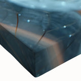 Close-up of frost patterns in black and white on a large stretched canvas, ideal for bedroom wall decor.