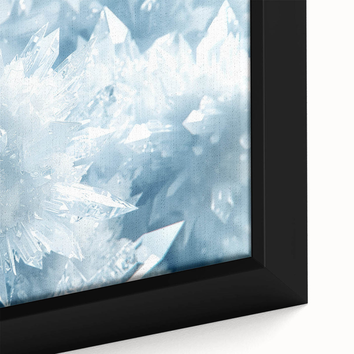 Framed canvas featuring a close-up of ice with frost, textured in black and colorful hues.