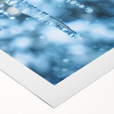Art deco poster featuring a close-up of frost patterns in muted blue and white tones on rolled canvas.
