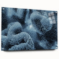 Close-up of frost patterns on acrylic glass, in muted blue and white tones, suitable for bedroom or dining room decor.