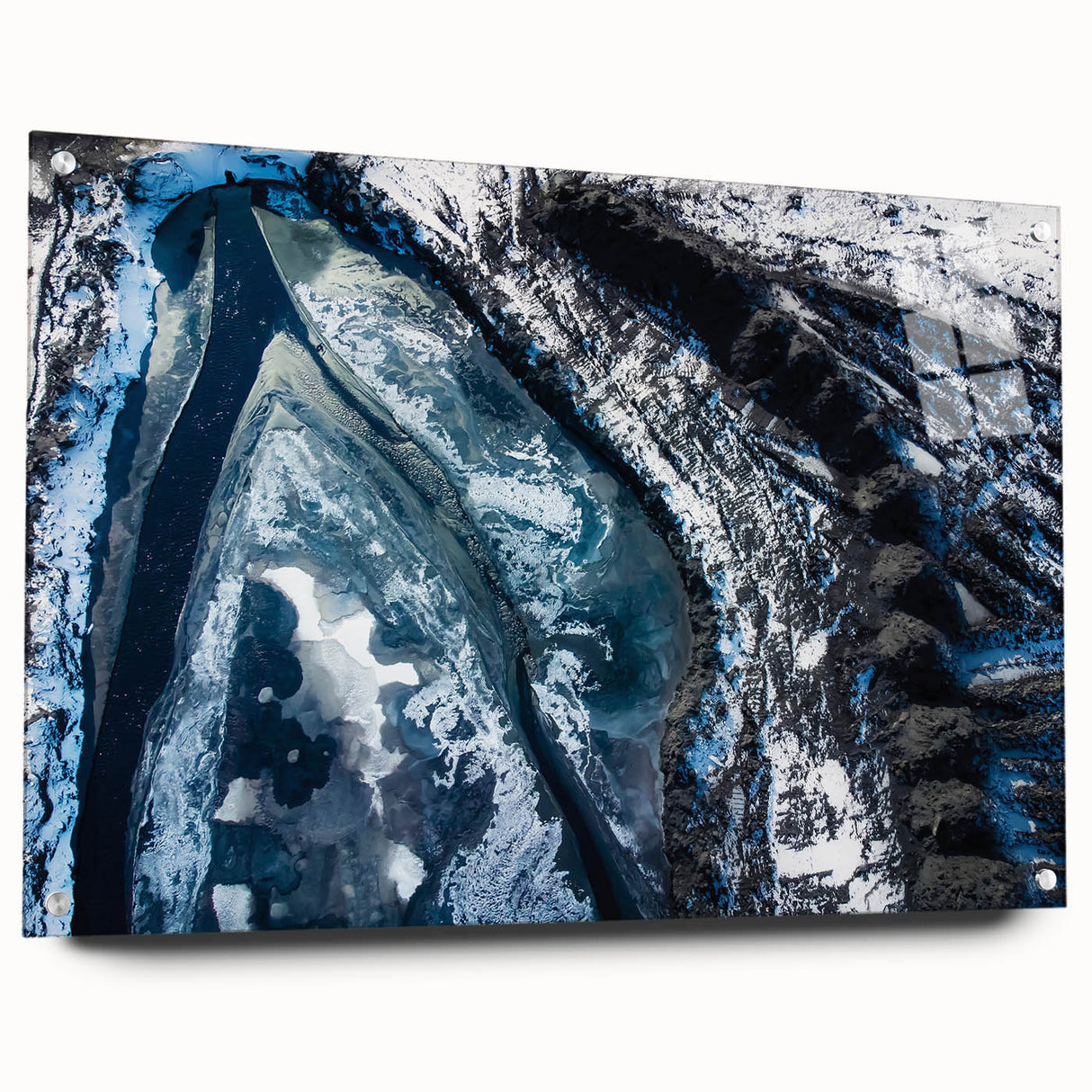 Close-up image of frost patterns on acrylic glass, featuring a monochrome blue palette.