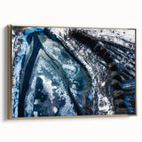 Framed canvas featuring a close-up of frost patterns in muted gray and blue tones.