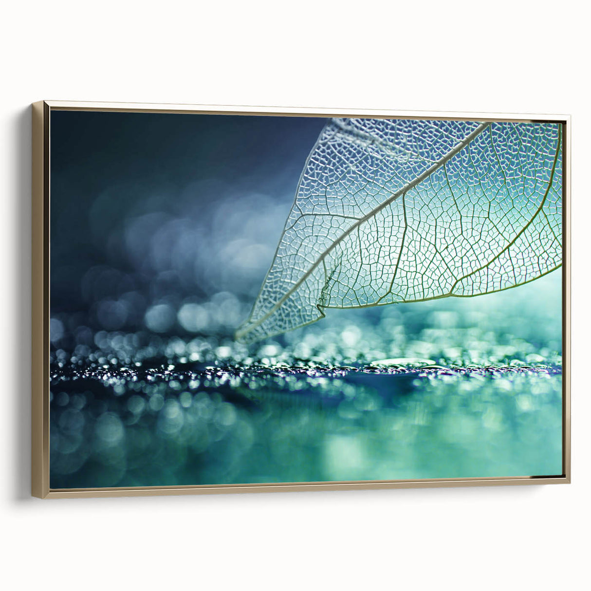 Framed canvas featuring a close-up of leaves in gold and black tones, suitable as wall art for bedroom.