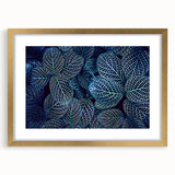 Extra large abstract art print featuring close-up of textured leaves in green and gold, framed in gold.