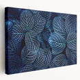 Close-up image of green leaves on a stretched canvas, ideal for kitchen wall art.