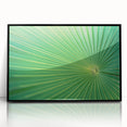 Large abstract wall art of leaves in muted green tones, framed in black acrylic, suitable for modern art wall decor.