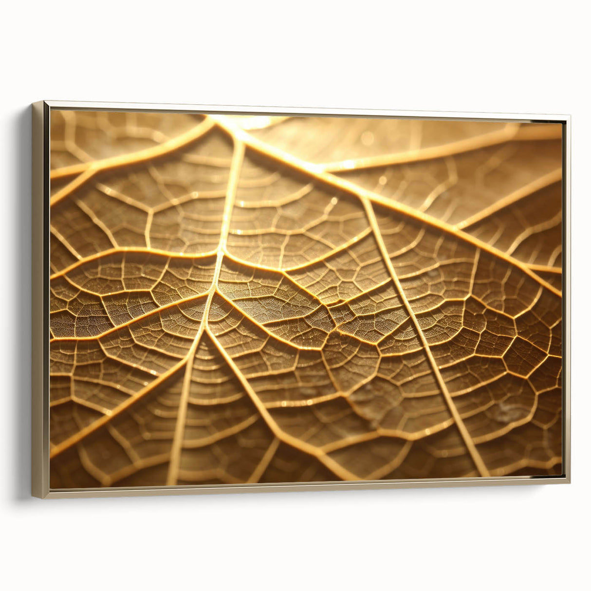 Framed canvas featuring close-up of leaves in gold tones, suitable as wall art for bedroom or living space.