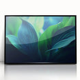 Large abstract wall art featuring close-up leaves in muted green and brown tones on a black framed acrylic.