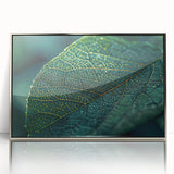 Mid-century modernist art depicting close-up leaves in earth tones, silver-framed acrylic, suitable for nursery wall art.