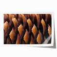 Close-up of floral elements in muted earth tones on a rolled canvas, suitable as art wall dining room decor.
