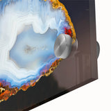 Large abstract wall art featuring natural elements in muted earth tones on acrylic glass, suitable for dining room ambiance.