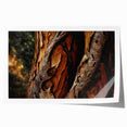 Close-up of tree branches in muted green and brown tones on extra large rolled canvas.