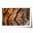 Close-up of tree bark in muted brown and green tones on a rolled canvas.