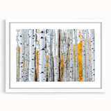 Abstract art print of close-up tree designs in muted green and brown tones, framed in white.