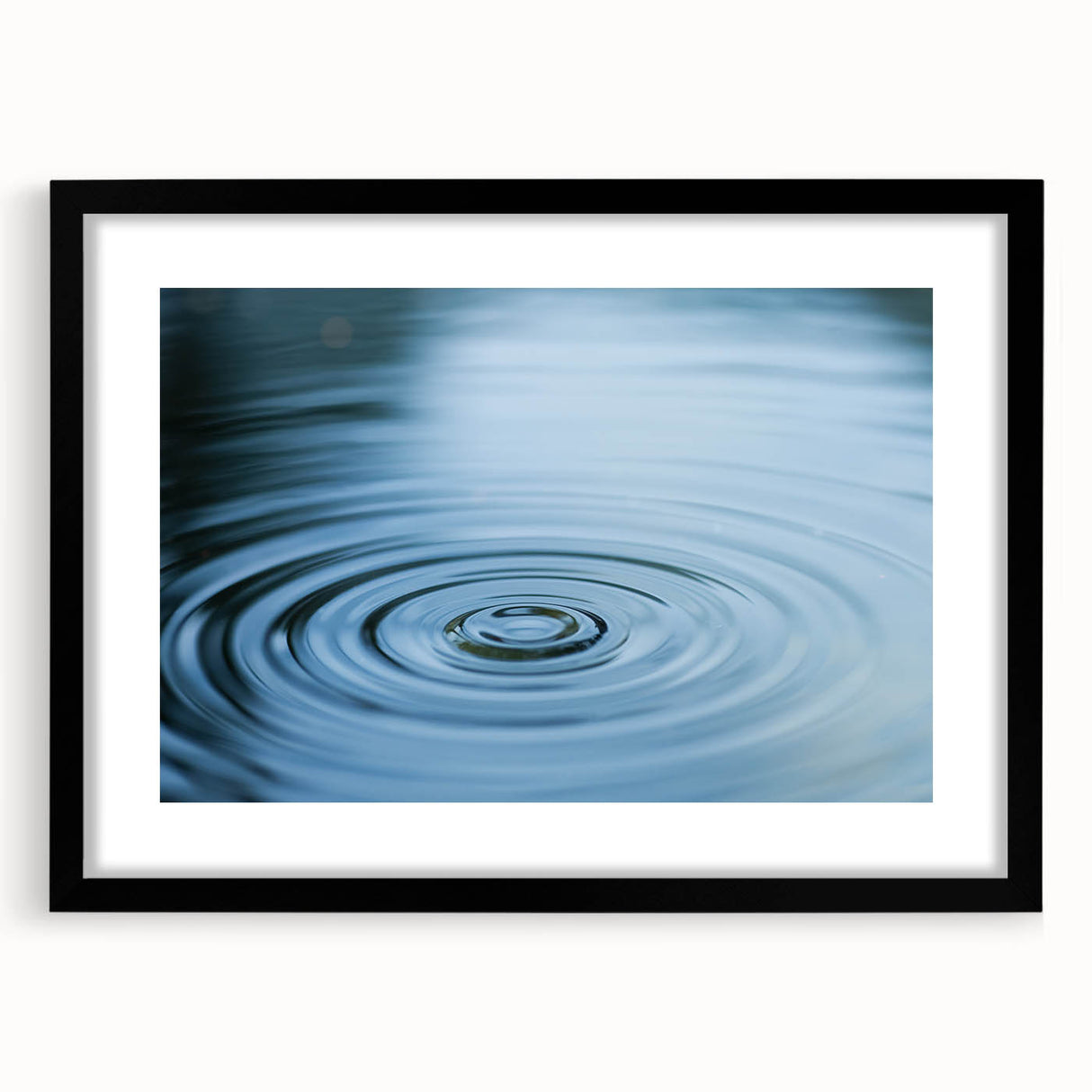 Extra large abstract art print featuring a textured, colorful water design on a black framed canvas.