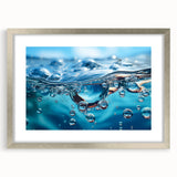 Textured abstract art print with swirling blue and gray tones on a framed canvas, suitable for bedroom art.