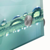 Large abstract wall art featuring close-up water ripple designs in blue tones on acrylic glass.