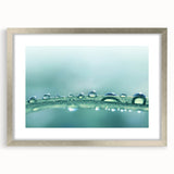 Textured art featuring abstract water design in silver frame, ideal for bedroom wall decor.
