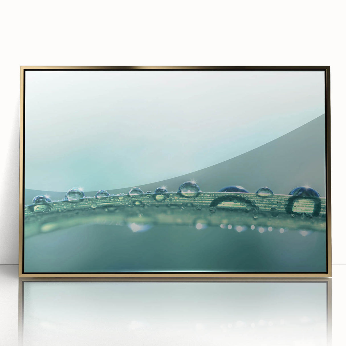 Large art print of a close-up water design in gold frame, featuring mid-century modernist style.