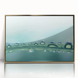Large art print of a close-up water design in gold frame, featuring mid-century modernist style.