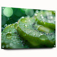 Close-up of water droplets on a leaf in vibrant greens and blues, printed on acrylic glass, suitable for dining room decor.