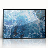 Large abstract wall art featuring swirling blue and green hues, framed in black acrylic, suitable for modern art wall decor.