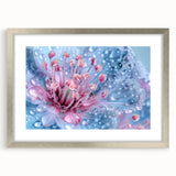 Textured abstract art print featuring swirling blue and gray patterns, framed in silver, ideal for bedroom art.