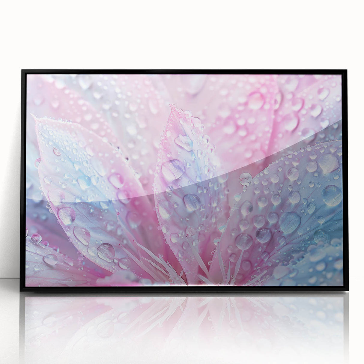 Large abstract wall art depicting water ripples in muted blue and gray tones, framed in black acrylic.
